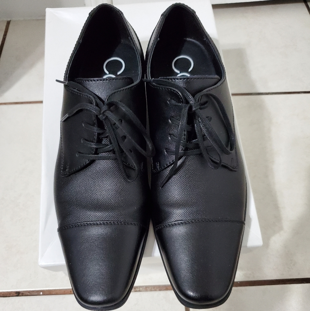 Calvin Klein men black fancy shoes.